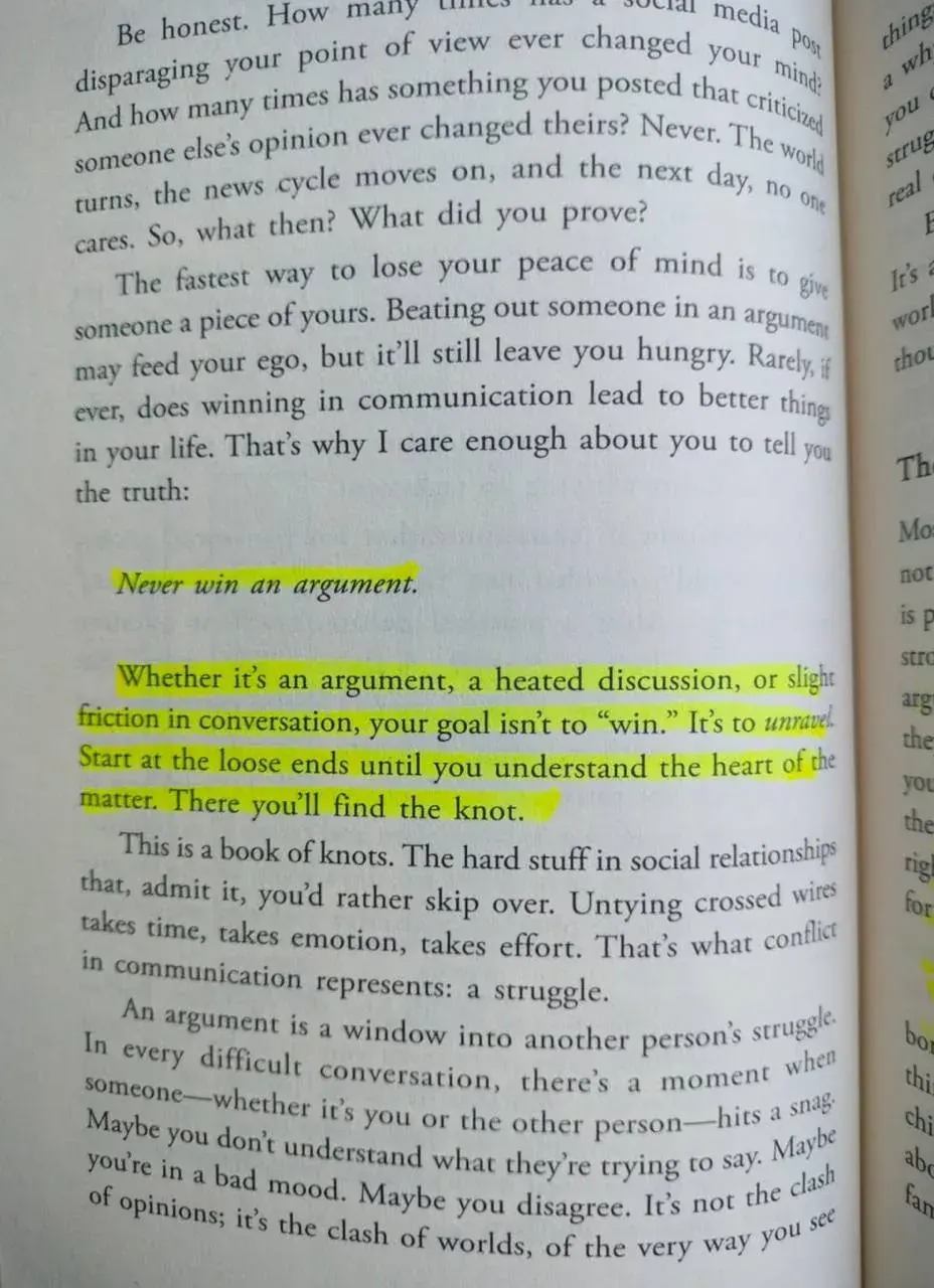 Portrait photo of a printed book page about arguments and communication, with partially readable English text