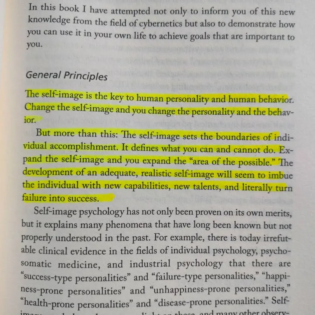 Close-up of an open book page discussing self-image psychology and personality types Close-up of an open book page discussing self-image psychology and personality types