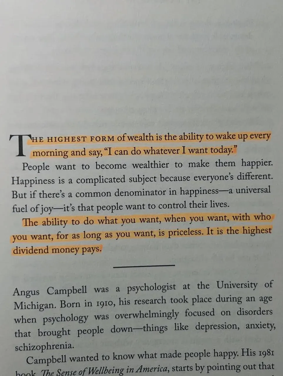 Portrait photo of a page with text about wealth, happiness, and control over one’s life